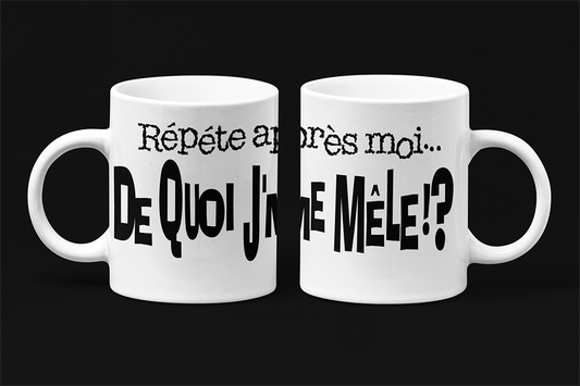 Une tasse comique de notre Collection Texte: Répète après moi...de quoi je me mêle.