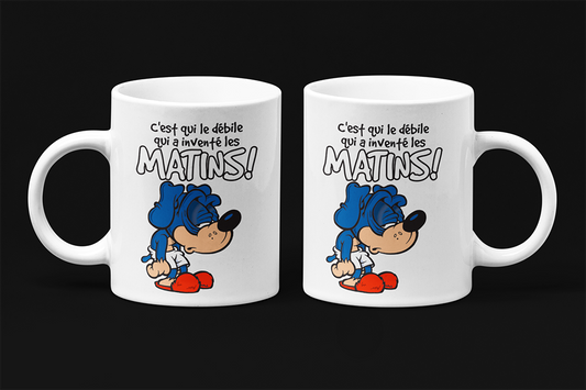 Une tasse en français de notre Collection Caractère: C'est qui le débile qui à inventé les matins