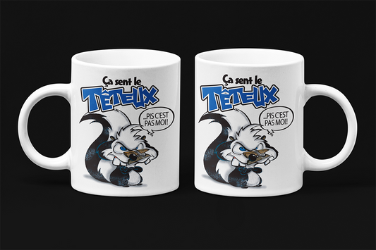 Une tasse humoristique de notre Collection Caractère: Ça sent le têteux... pis c'est pas moi!